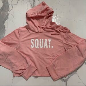 Pink Cropped Hoodie with 'SQUAT' Print